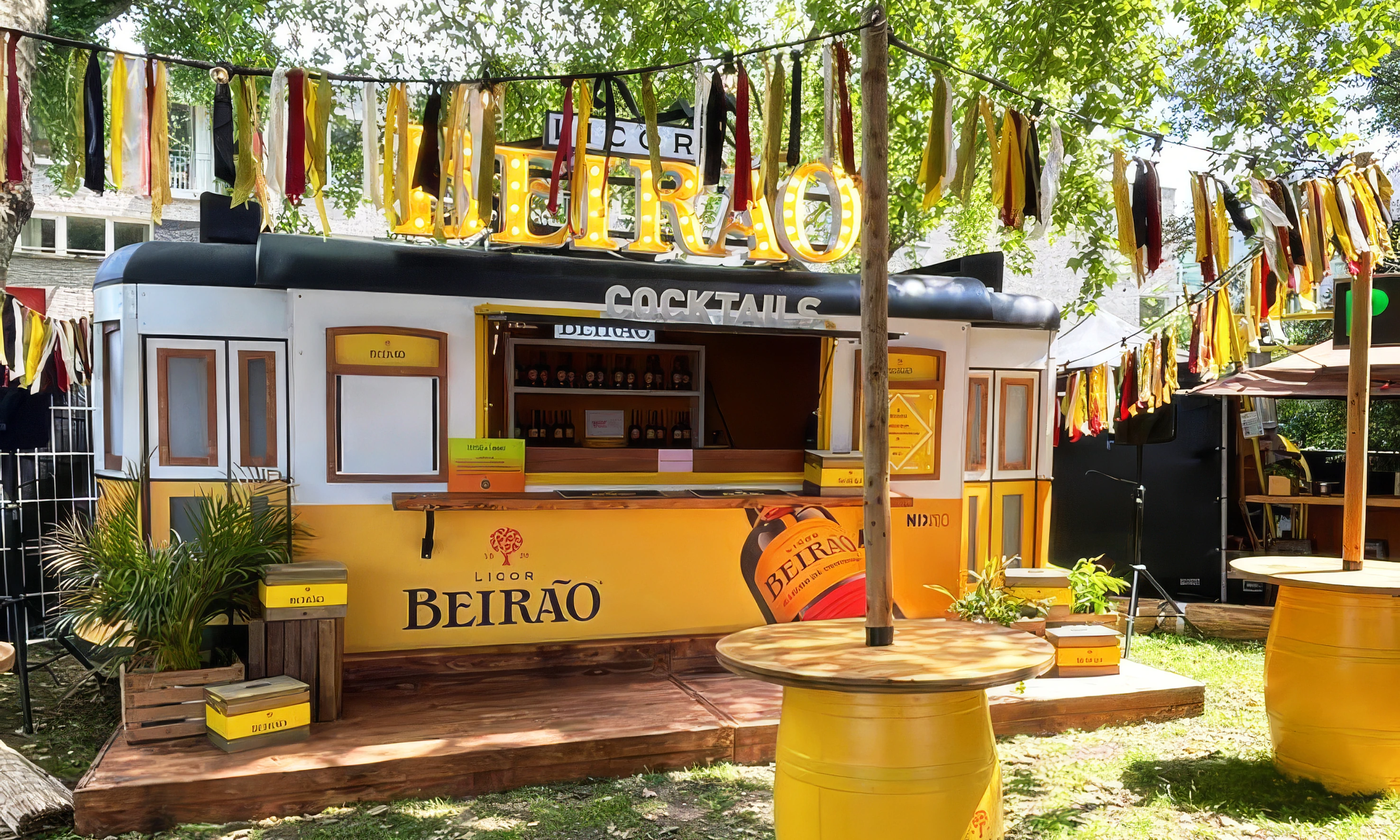 Licor Beirao mobile bar beneath the trees