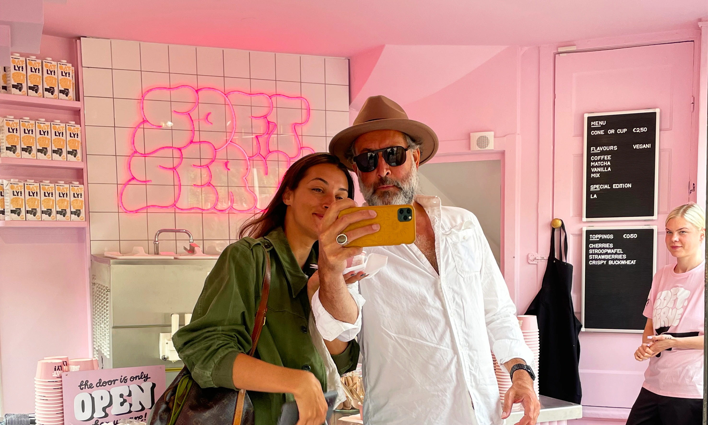 Visitors at the Oatly pink popup